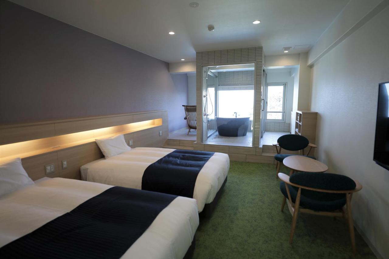 Hotel Izukyu Сидзуока Номер фото